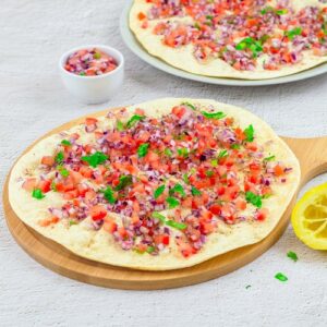 Masala papad with tomato and onion toppings